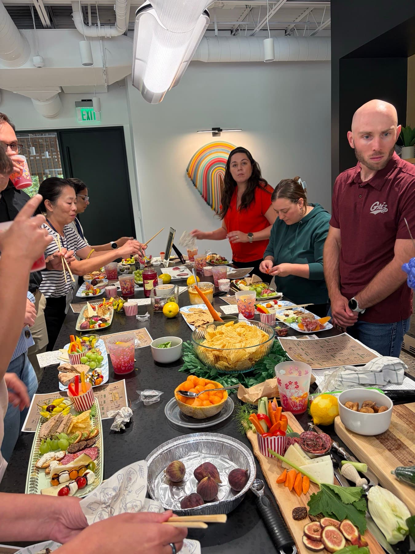 Tenants building charcuterie boards at a hands-on workshop